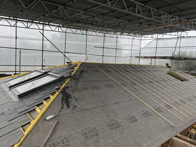 Roof slating with rooflights going in