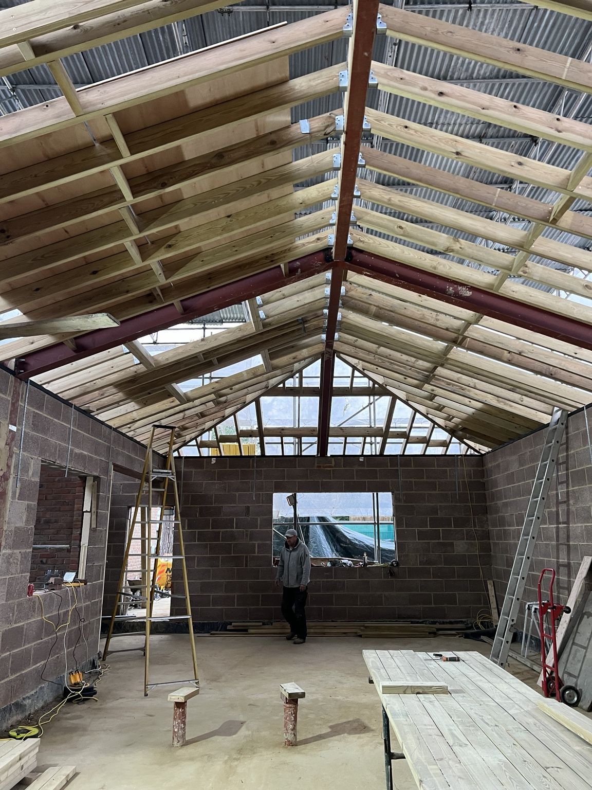 Timber roof structure and steelwork on a house extension